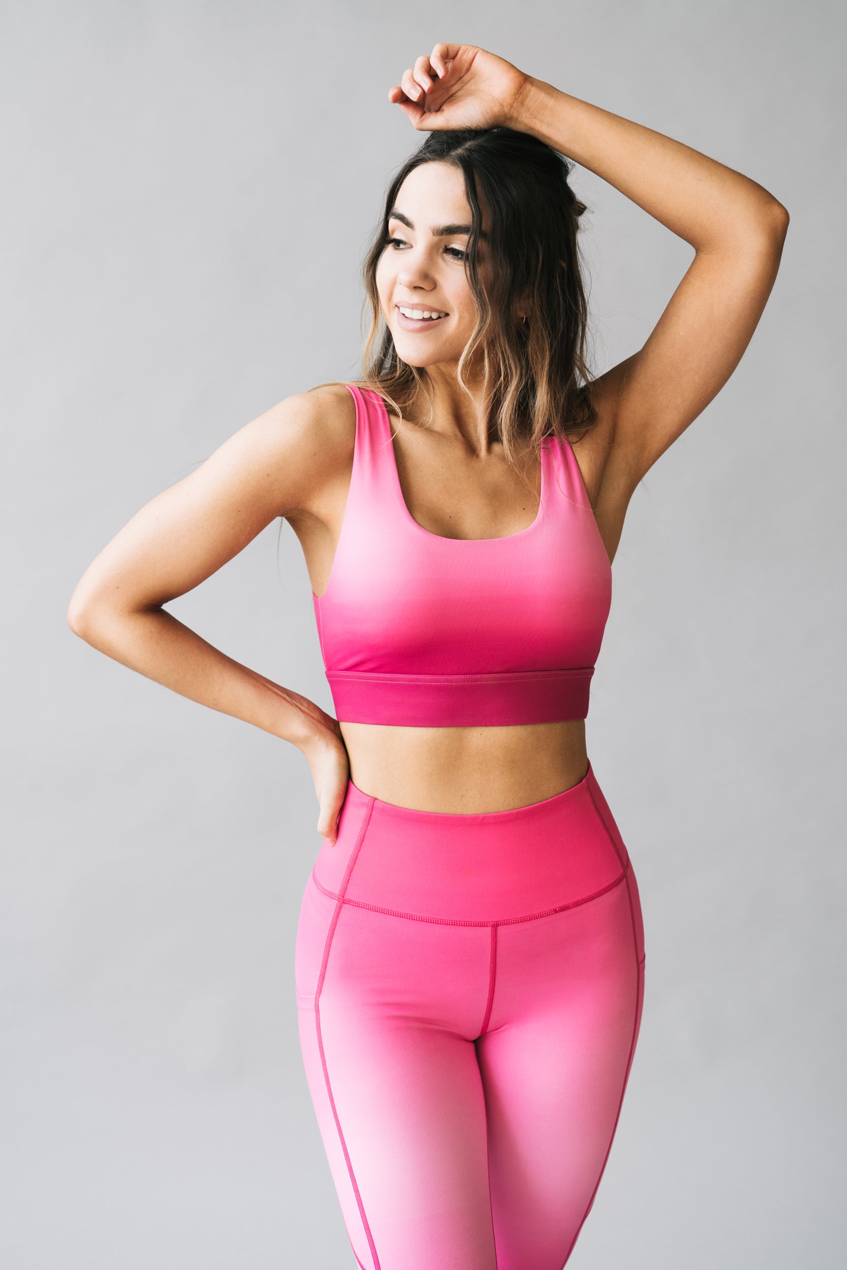 Bombshell pink snake print leggings in medium and matching sports bra in  med.